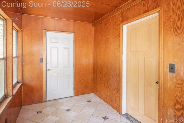 785 Kenilworth Ave, Pontiac, MI 48340 - entrance foyer featuring wood ceiling, wood walls, and light tile patterned floors