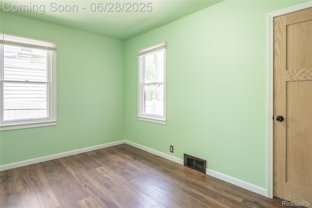 785 Kenilworth Ave, Pontiac, MI 48340 - unfurnished room with dark wood-style floors and baseboards