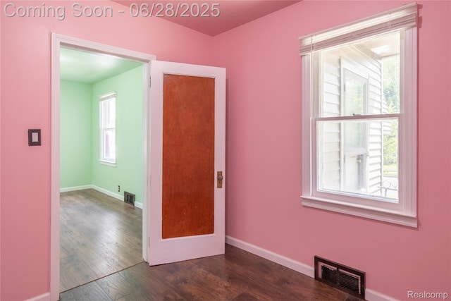 785 Kenilworth Ave, Pontiac, MI 48340 - empty room with dark wood-type flooring and baseboards