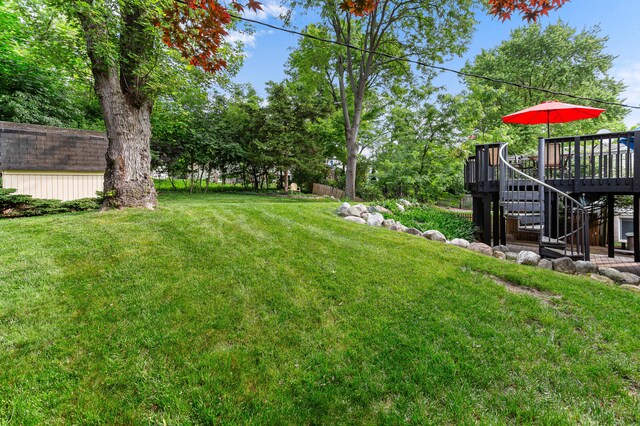 525 Langfield St, Northville, MI 48167 - view of grassy yard featuring a wooden deck and stairs
