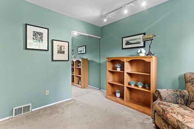 525 Langfield St, Northville, MI 48167 - living area with carpet flooring and track lighting