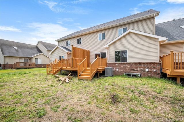 24790 Ashley Ct, Redford, MI 48239 - rear view of property featuring a deck, stairway, brick siding, and a yard