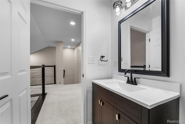 24790 Ashley Ct, Redford, MI 48239 - bathroom featuring vanity, recessed lighting, and vaulted ceiling