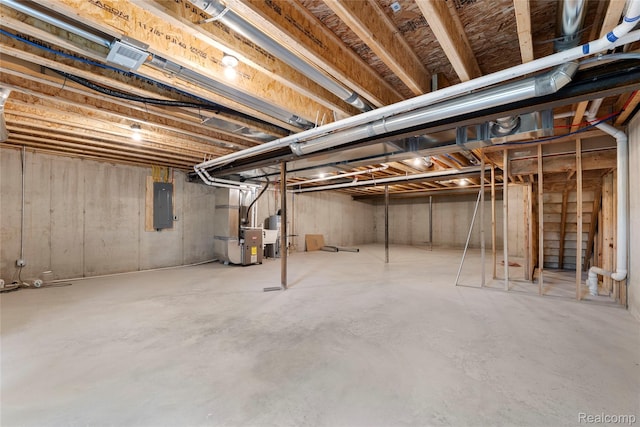 24790 Ashley Ct, Redford, MI 48239 - unfinished below grade area featuring electric panel and heating unit