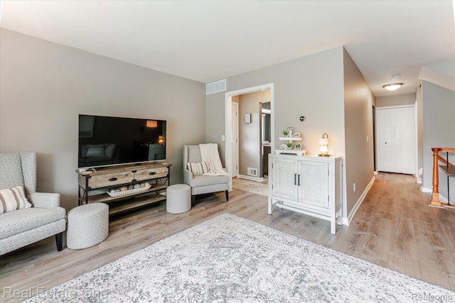 1106 Kings Cove Dr Unit 355, Rochester, MI 48306 - living area featuring wood finished floors