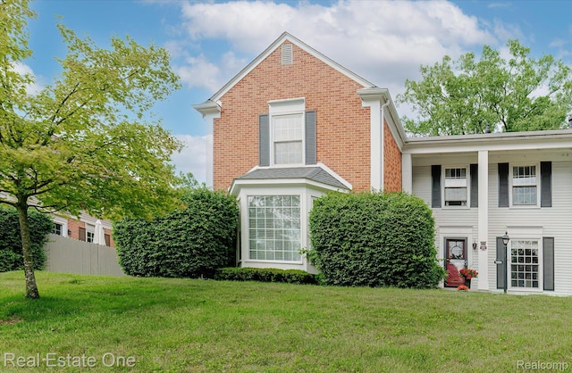 1106 Kings Cove Dr Unit 355, Rochester, MI 48306 - traditional-style home with brick siding