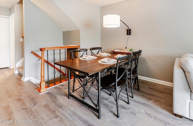 1106 Kings Cove Dr Unit 355, Rochester, MI 48306 - dining space featuring light wood-style flooring