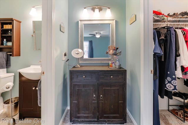 1106 Kings Cove Dr Unit 355, Rochester, MI 48306 - bathroom featuring vanity and a spacious closet