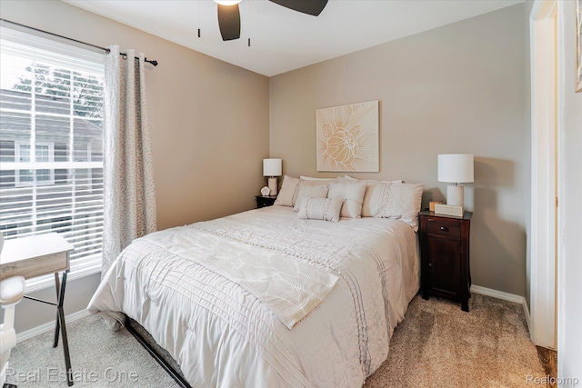 1106 Kings Cove Dr Unit 355, Rochester, MI 48306 - bedroom featuring light carpet and ceiling fan