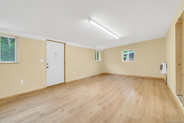 6761 Mels Dr, Ruby, MI 48049 - spare room with light wood-style flooring and baseboards