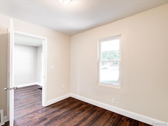 1918 16th St, Port Huron, MI 48060 - unfurnished room featuring dark wood-style floors and baseboards