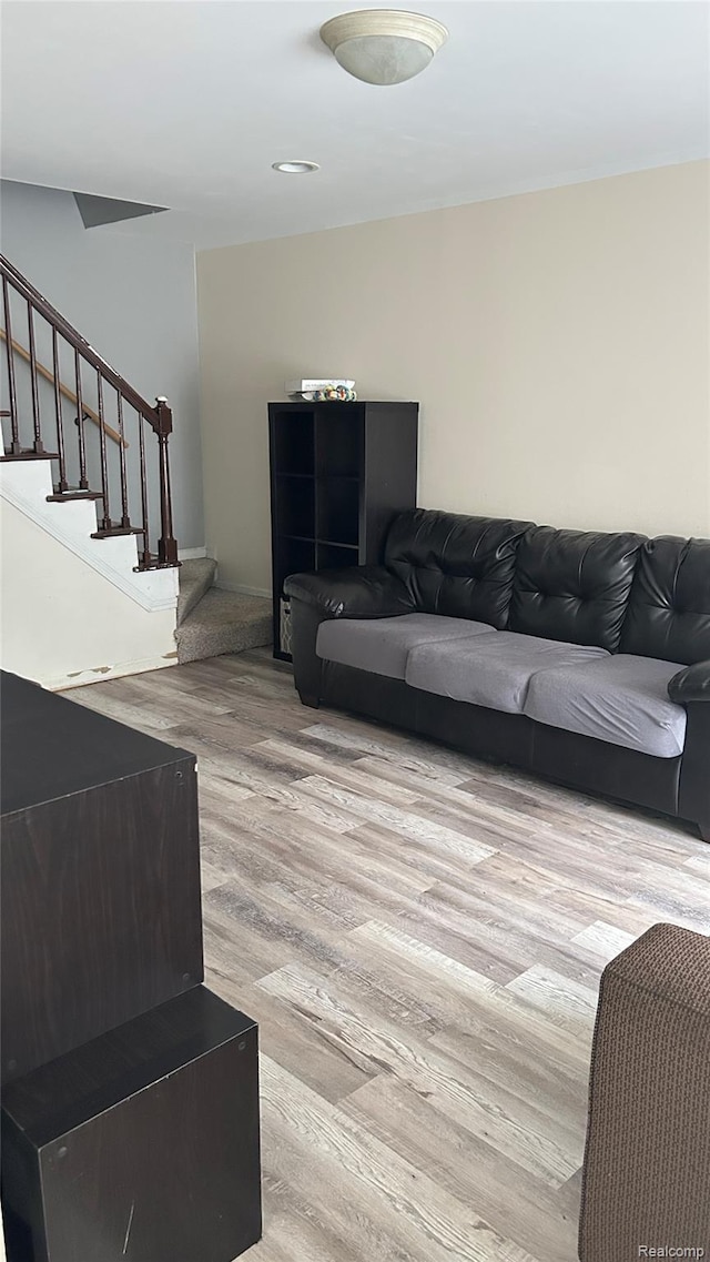 36014 Chapel Ct, Clinton Township, MI 48035 - living room featuring light wood-style flooring and stairway