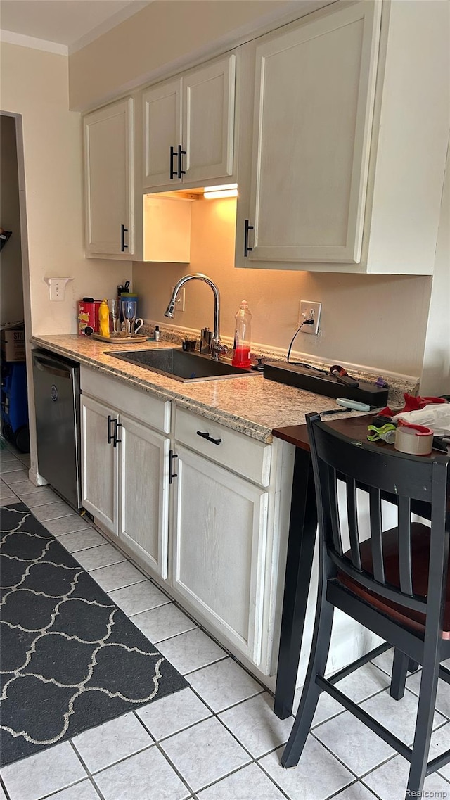 36014 Chapel Ct, Clinton Township, MI 48035 - kitchen with dishwashing machine, crown molding, white cabinetry, and light tile patterned floors