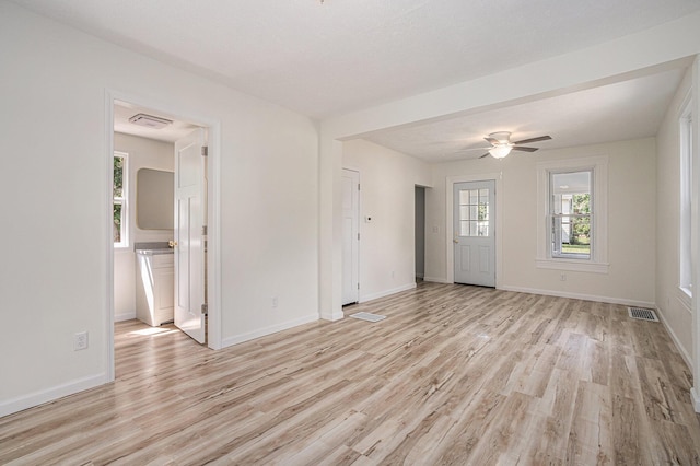 556 Union St, Niles, MI 49120 - unfurnished living room featuring light wood-style floors and a ceiling fan