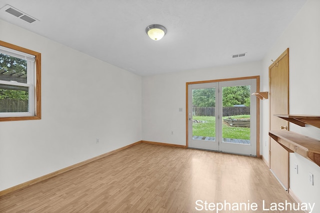 169 S Linda St NE, Cedar Springs, MI 49319 - unfurnished room featuring healthy amount of natural light and light wood-style floors