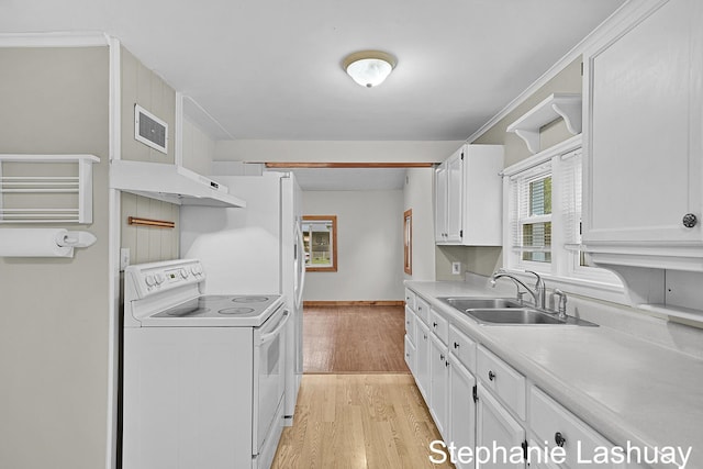 169 S Linda St NE, Cedar Springs, MI 49319 - kitchen featuring white electric range oven, white cabinets, and light wood-type flooring