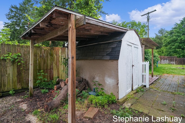 169 S Linda St NE, Cedar Springs, MI 49319 - view of shed featuring a fenced backyard