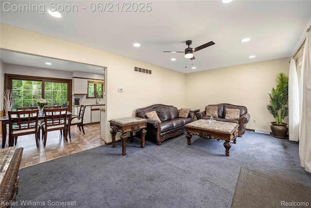 3123 W Utica Rd, Shelby Twp, MI 48317 - carpeted living room featuring recessed lighting and ceiling fan