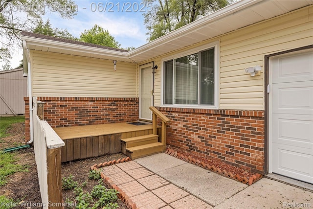 3123 W Utica Rd, Shelby Twp, MI 48317 - view of patio / terrace featuring a garage