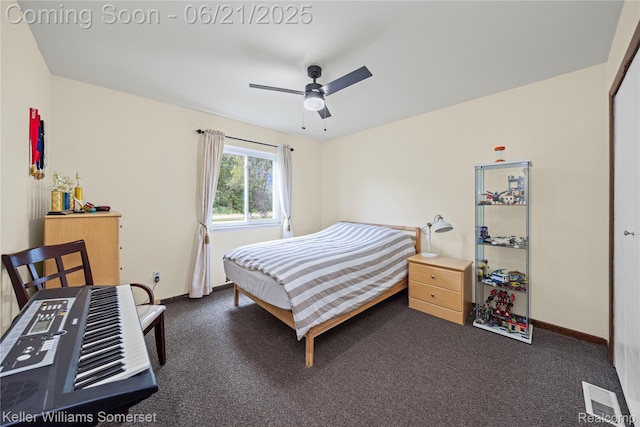 3123 W Utica Rd, Shelby Twp, MI 48317 - bedroom with ceiling fan and dark colored carpet