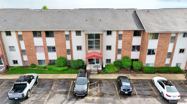 1924 Klingensmith Rd Unit 68B, Bloomfield Hills, MI 48302 - view of property with uncovered parking