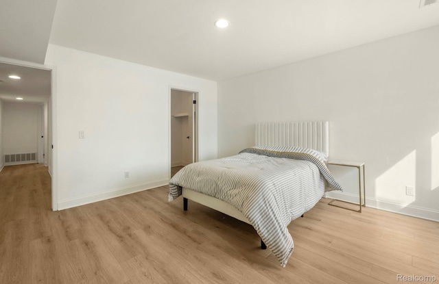 1924 Klingensmith Rd Unit 68B, Bloomfield Hills, MI 48302 - bedroom featuring light wood finished floors and recessed lighting