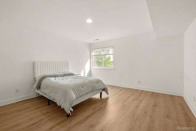 1924 Klingensmith Rd Unit 68B, Bloomfield Hills, MI 48302 - bedroom featuring light wood-style floors and recessed lighting