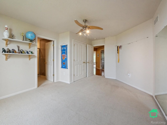 6345 Brookview Dr, Saline, MI 48176 - unfurnished bedroom with light carpet and ceiling fan