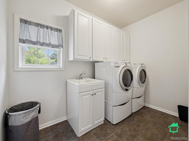 6345 Brookview Dr, Saline, MI 48176 - laundry area featuring washer and dryer and cabinet space