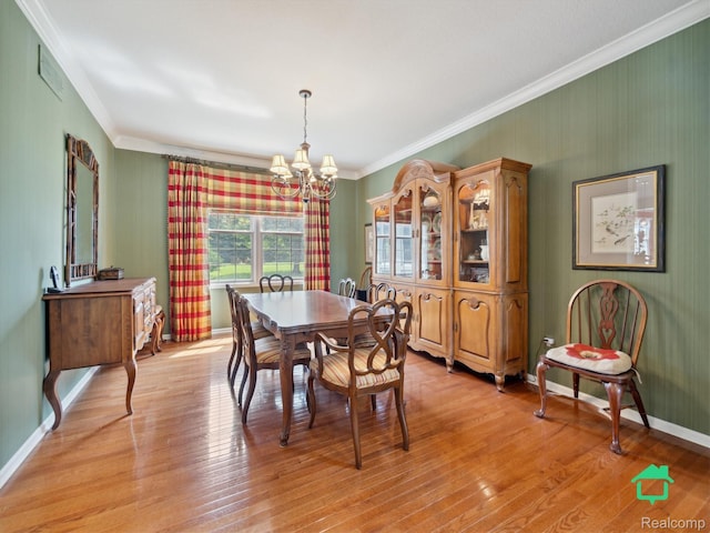 6345 Brookview Dr, Saline, MI 48176 - dining space featuring a chandelier, crown molding, and light wood-style floors