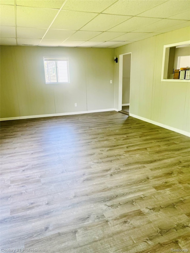 14463 Leonard Ave, Warren, MI 48089 - unfurnished room with a drop ceiling and wood finished floors