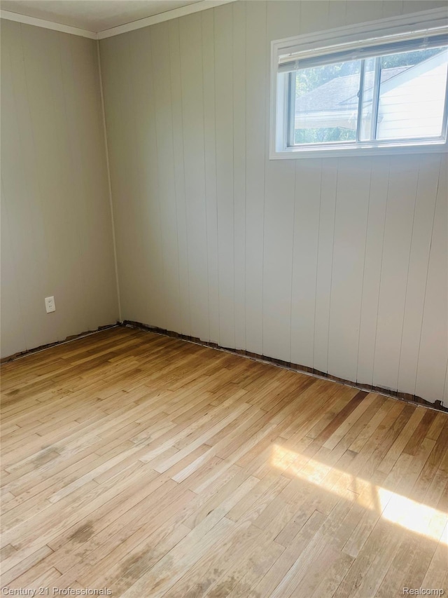 14463 Leonard Ave, Warren, MI 48089 - unfurnished room featuring light wood finished floors and crown molding