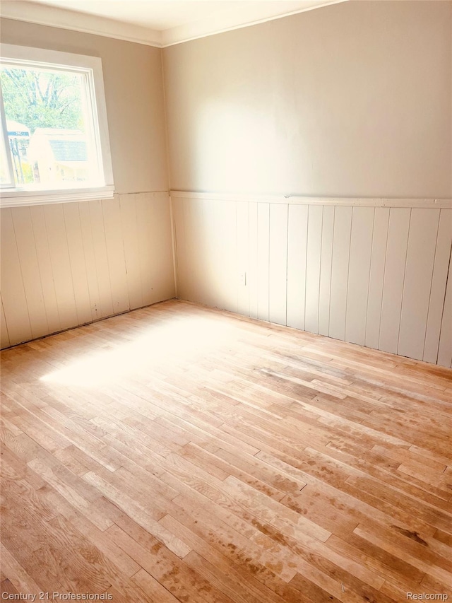 14463 Leonard Ave, Warren, MI 48089 - spare room featuring hardwood / wood-style flooring, wainscoting, and ornamental molding