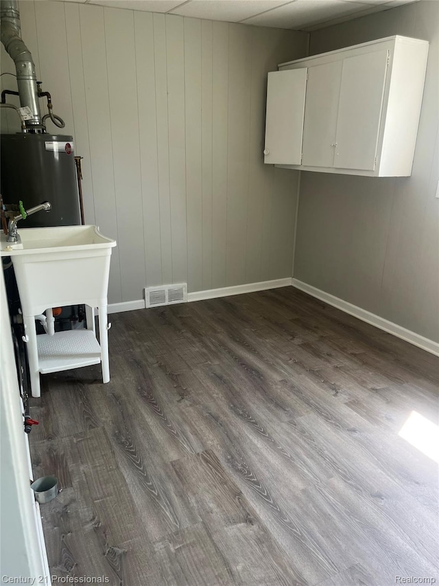 14463 Leonard Ave, Warren, MI 48089 - interior space with dark wood-type flooring and gas water heater