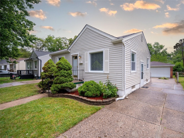 25457 Andover Dr, Dearborn Heights, MI 48125 - bungalow-style home featuring a yard and a garage