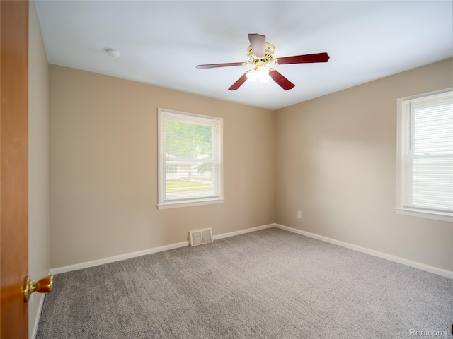 25457 Andover Dr, Dearborn Heights, MI 48125 - spare room featuring carpet and ceiling fan