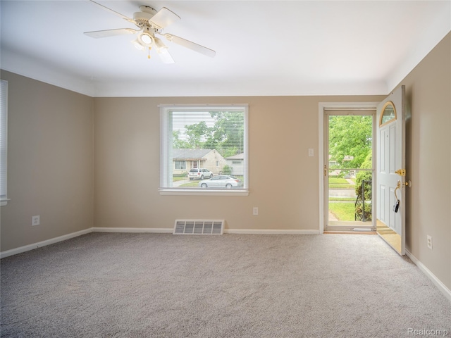 25457 Andover Dr, Dearborn Heights, MI 48125 - unfurnished room featuring healthy amount of natural light, carpet flooring, and ceiling fan