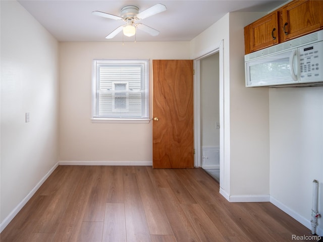 25457 Andover Dr, Dearborn Heights, MI 48125 - unfurnished dining area with wood finished floors and ceiling fan