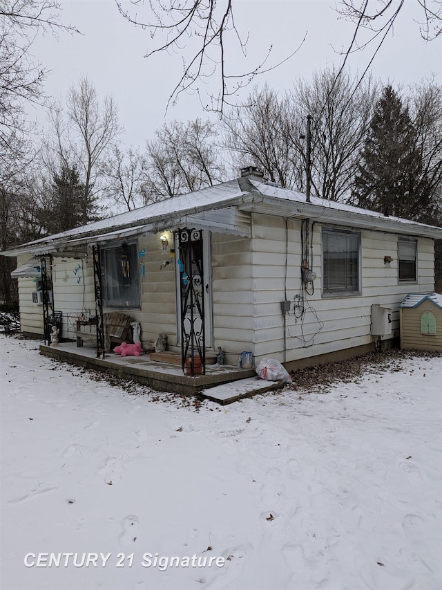 3030 Mccollum Ave, Flint, MI 48504 - bungalow-style home featuring a chimney