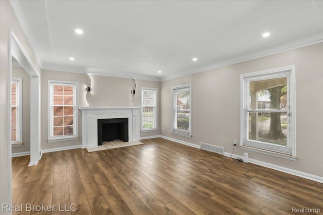 15873 Kentfield St, Dearborn, MI 48223 - unfurnished living room featuring ornamental molding, wood finished floors, a fireplace with flush hearth, and recessed lighting