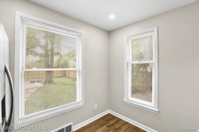 15873 Kentfield St, Dearborn, MI 48223 - spare room with dark wood-type flooring and recessed lighting