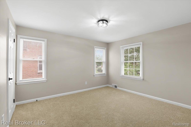 15873 Kentfield St, Dearborn, MI 48223 - carpeted spare room with baseboards