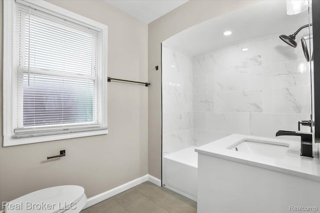 15873 Kentfield St, Dearborn, MI 48223 - bathroom featuring healthy amount of natural light, vanity, tile patterned floors, and washtub / shower combination
