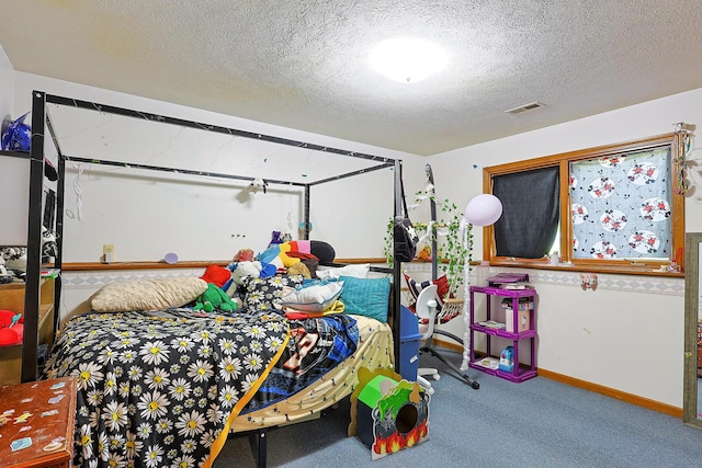 4651 Remembrance Rd NW, Grand Rapids, MI 49534 - carpeted bedroom featuring baseboards and a textured ceiling
