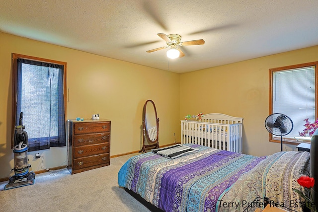 4651 Remembrance Rd NW, Grand Rapids, MI 49534 - carpeted bedroom featuring multiple windows and a ceiling fan