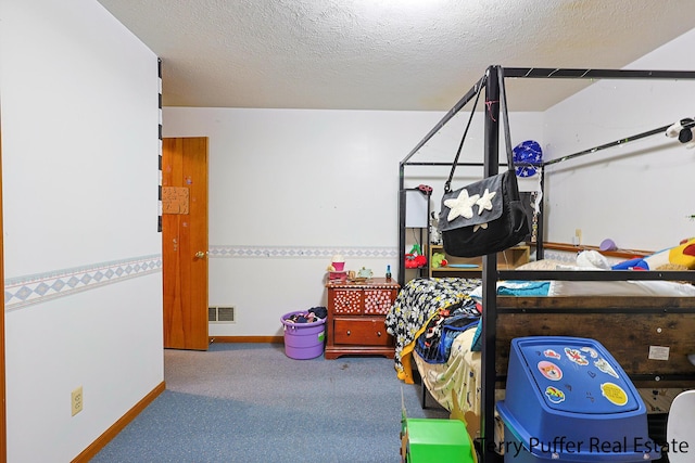 4651 Remembrance Rd NW, Grand Rapids, MI 49534 - carpeted bedroom featuring a textured ceiling and baseboards