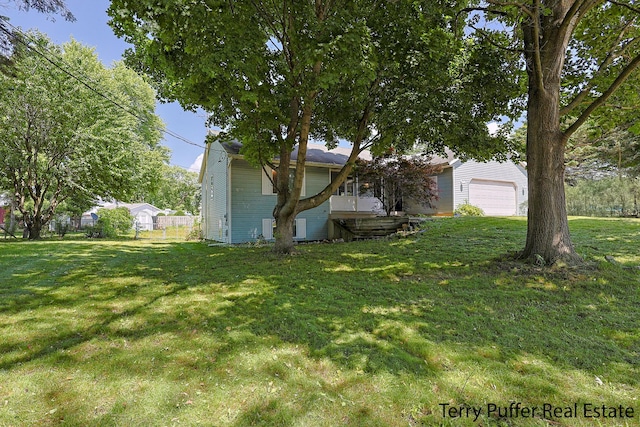 4651 Remembrance Rd NW, Grand Rapids, MI 49534 - view of front of property with a garage