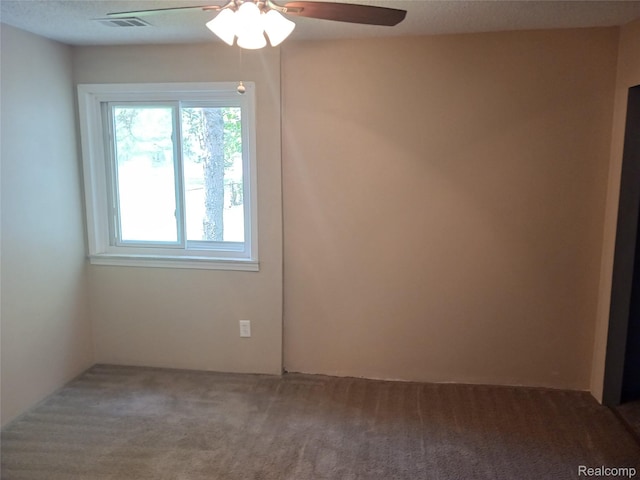 11132 Cape Cod St, Taylor, MI 48180 - carpeted empty room with a ceiling fan