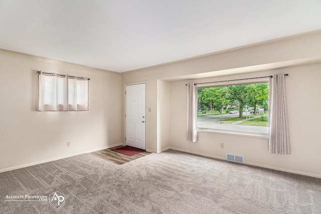 1006 Southlawn Ave, Flint, MI 48507 - carpeted spare room with baseboards