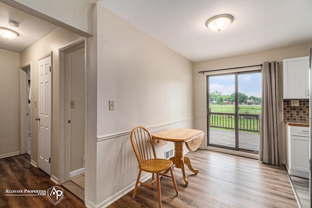 1006 Southlawn Ave, Flint, MI 48507 - dining space featuring wood finished floors